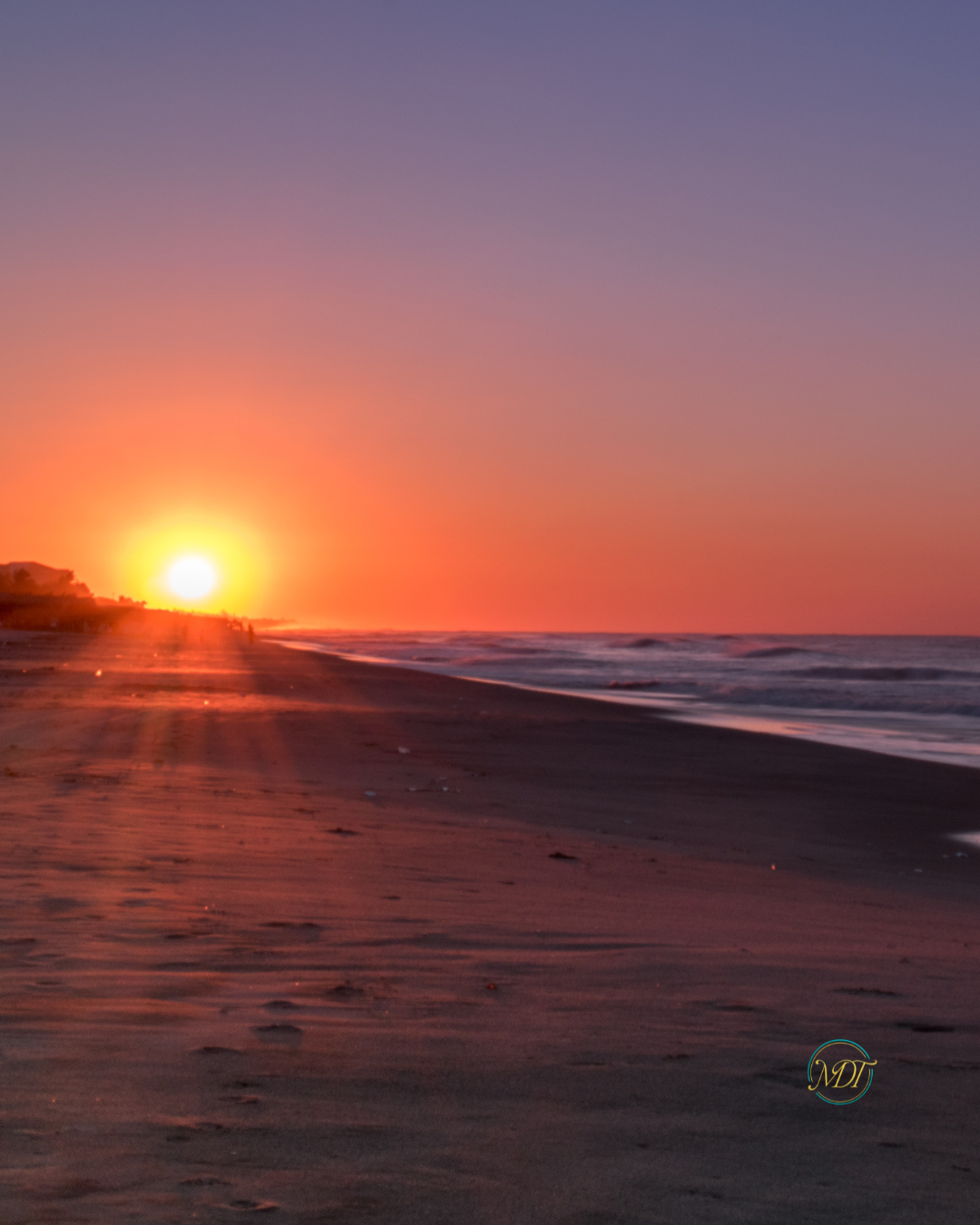 Sunrise over the beach symbolizing stress-free travel and the rewards of early planning.